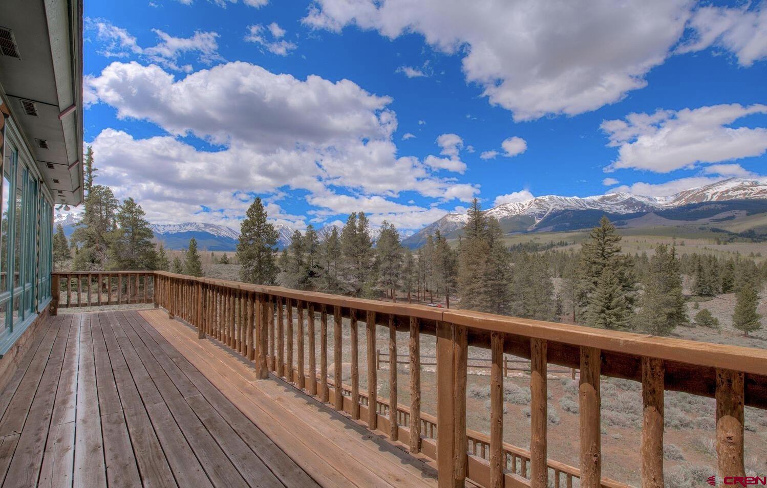 1499 Lake County Road Twin Lakes, CO 81251 - Photo 27 of 37 a view of a balcony with wooden fence