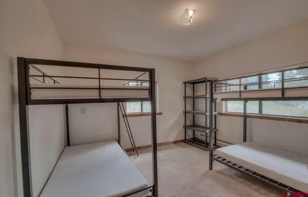 a view of balcony with wooden floor