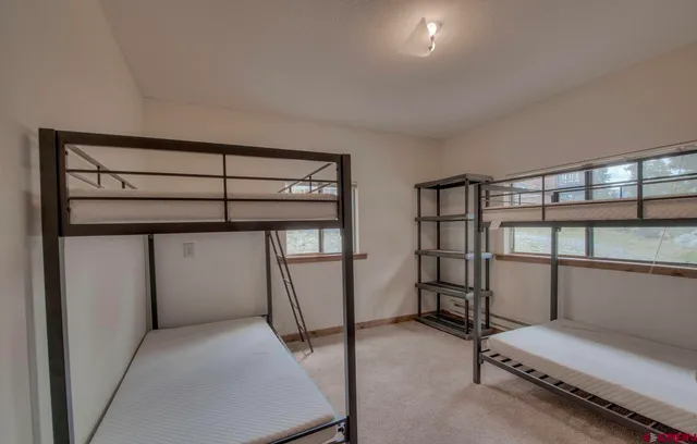 a view of balcony with wooden floor