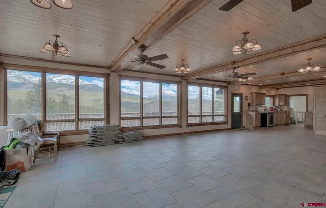 a kitchen with sink cabinets and outdoor view