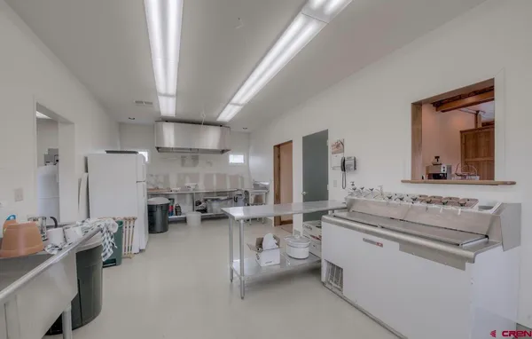 a room with furniture and a book shelf