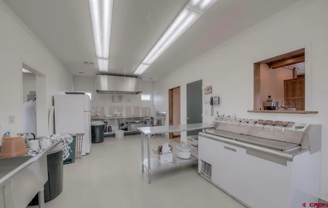 a room with furniture and a book shelf