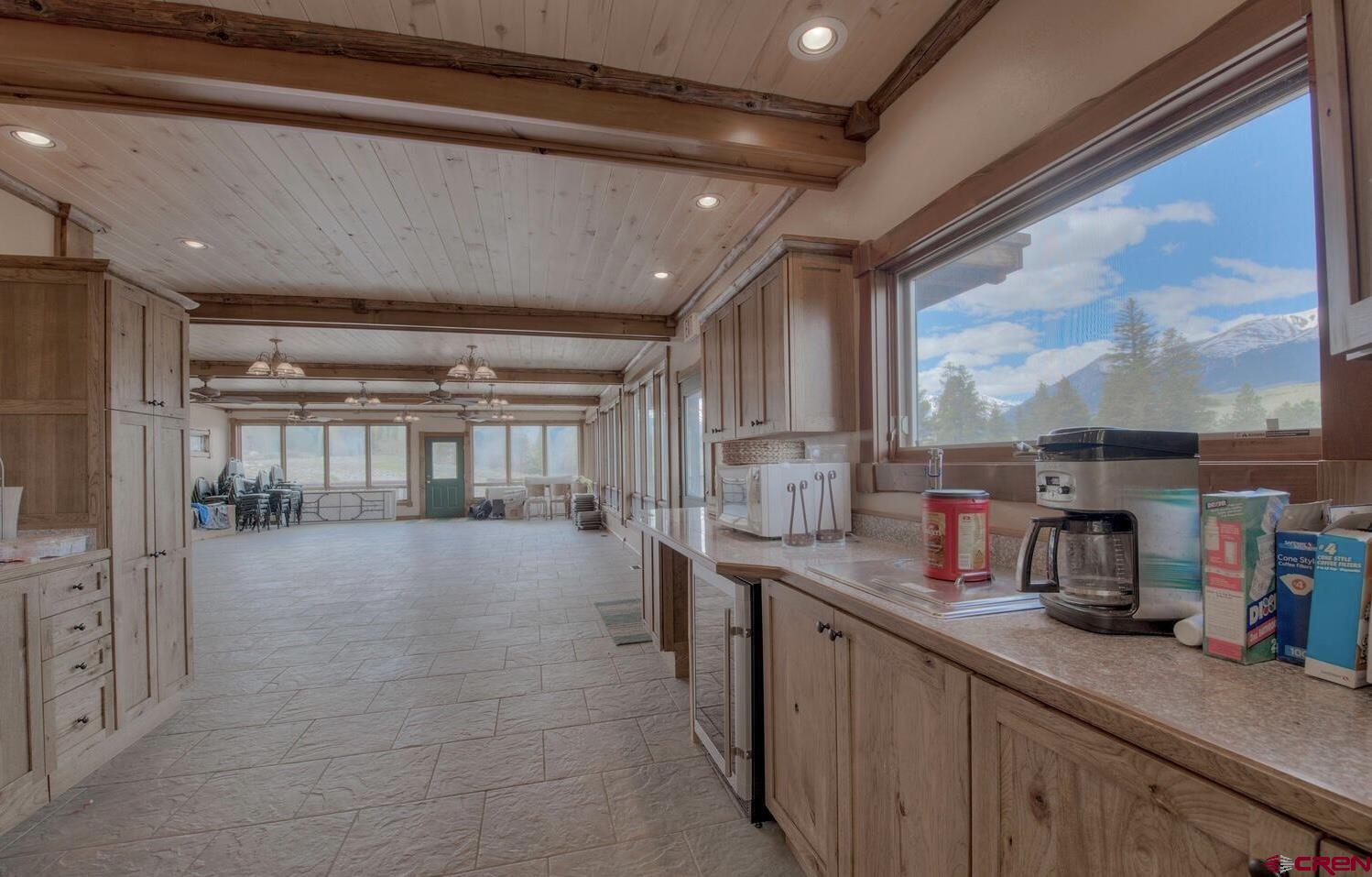 1499 Lake County Road Twin Lakes, CO 81251 - Photo 35 of 37 a kitchen with sink cabinets and outdoor view