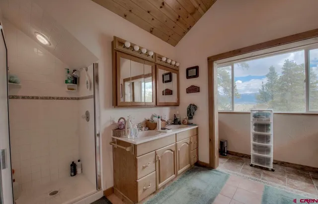 a bed room with a bed and a couch