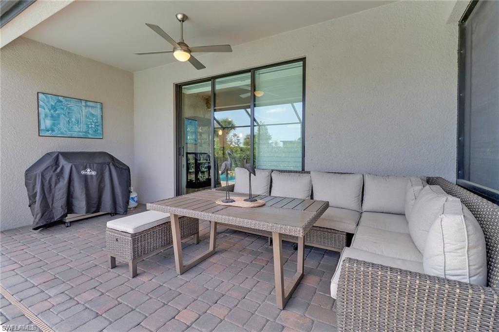 17609 Ashcomb Way Estero, FL 33928 - Photo 16 of 40 View of patio / terrace featuring outdoor seating, ceiling fan, and grilling area