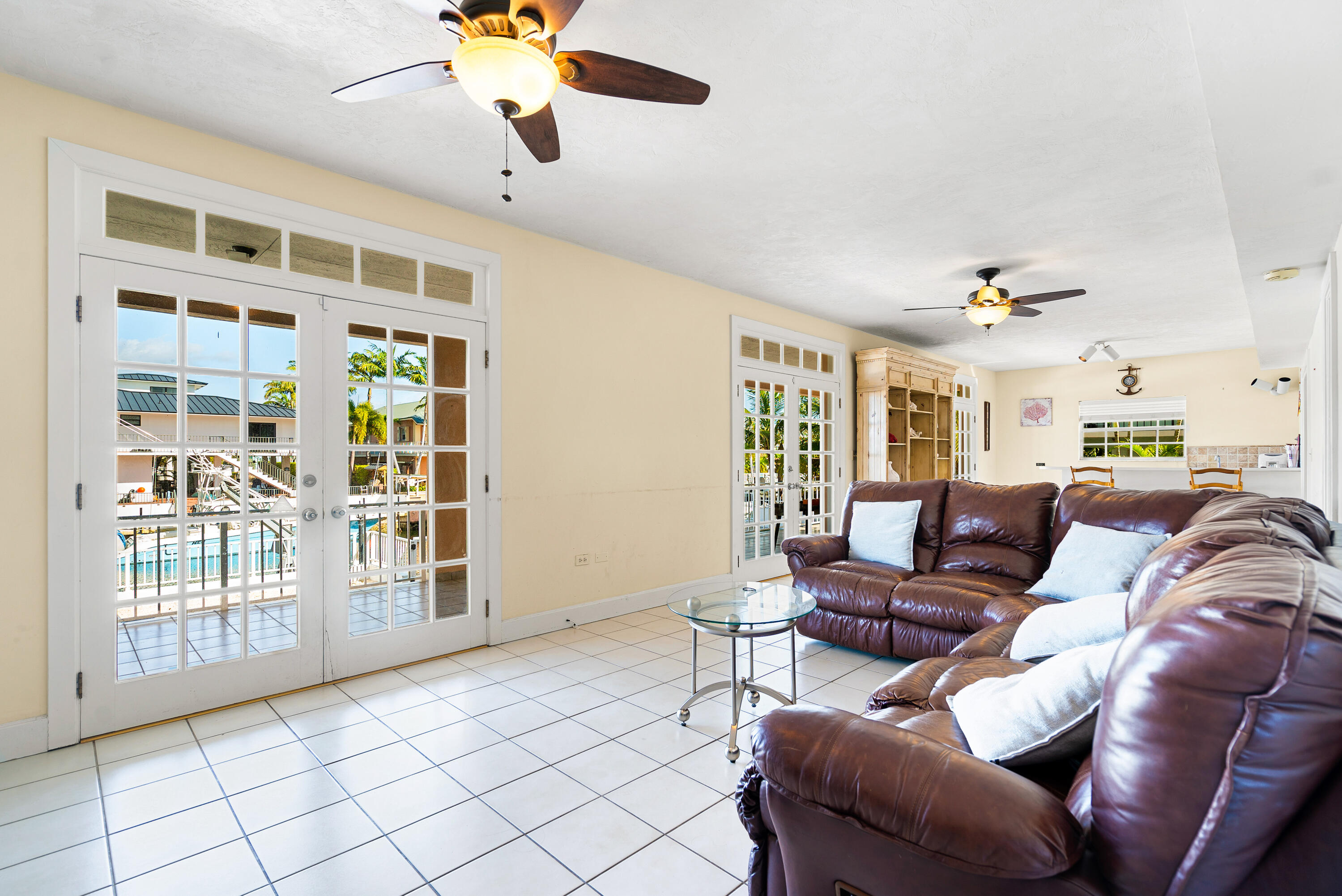 239 Atlantic Boulevard Key Largo, FL 33037 - Photo 13 of 50 a living room with furniture and a window