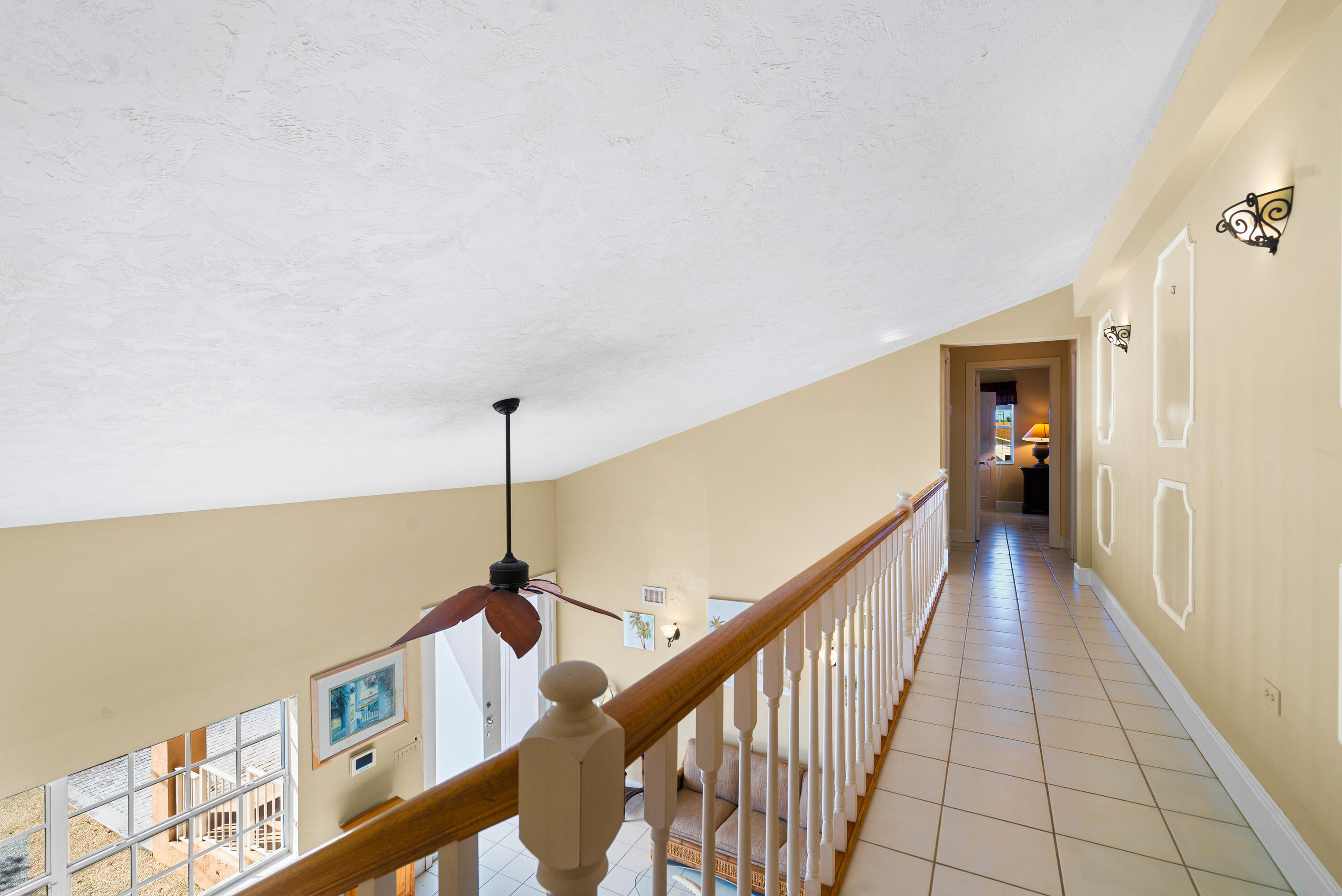 239 Atlantic Boulevard Key Largo, FL 33037 - Photo 22 of 50 a view of a hallway with windows