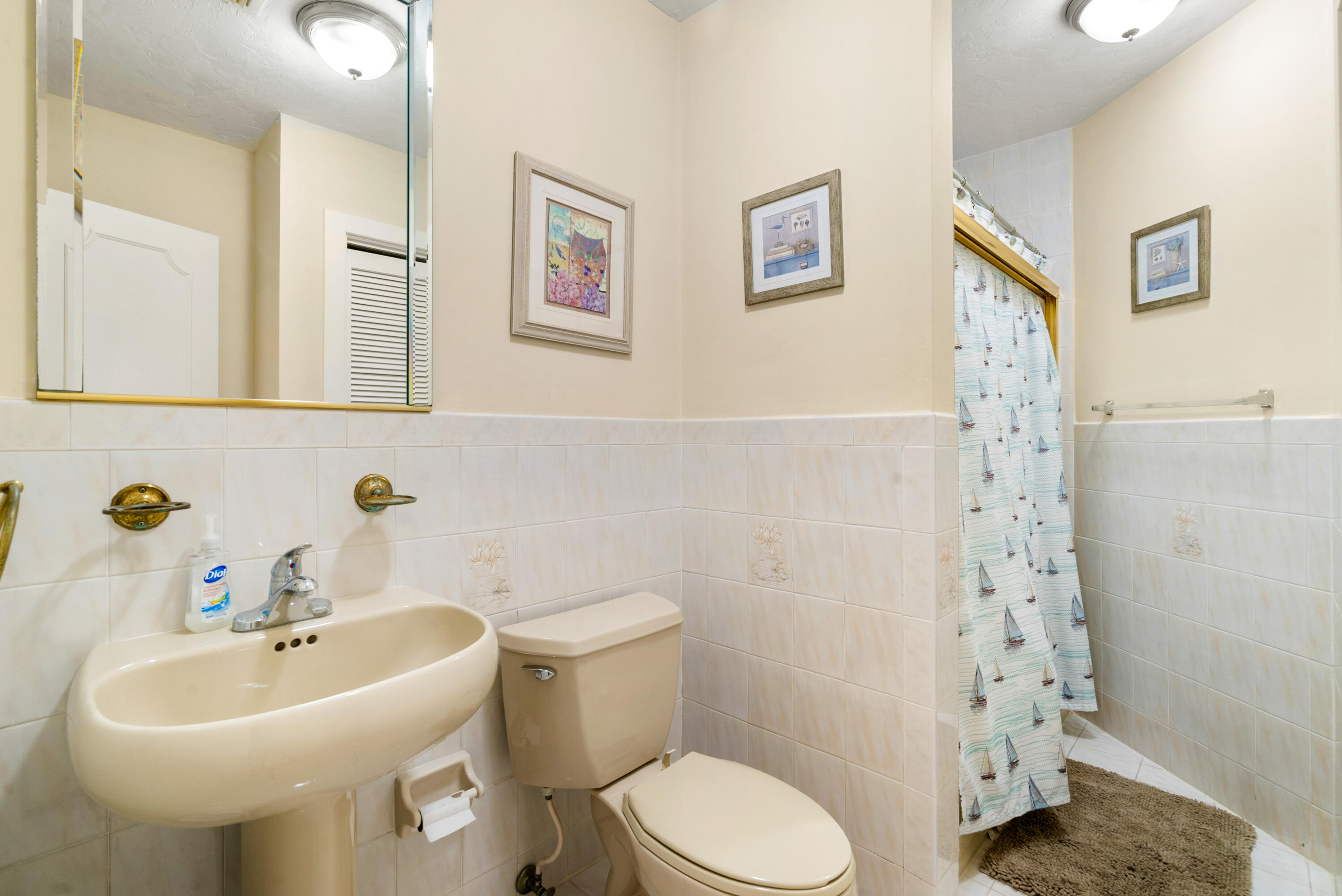 239 Atlantic Boulevard Key Largo, FL 33037 - Photo 30 of 50 a bathroom with a sink toilet and shower