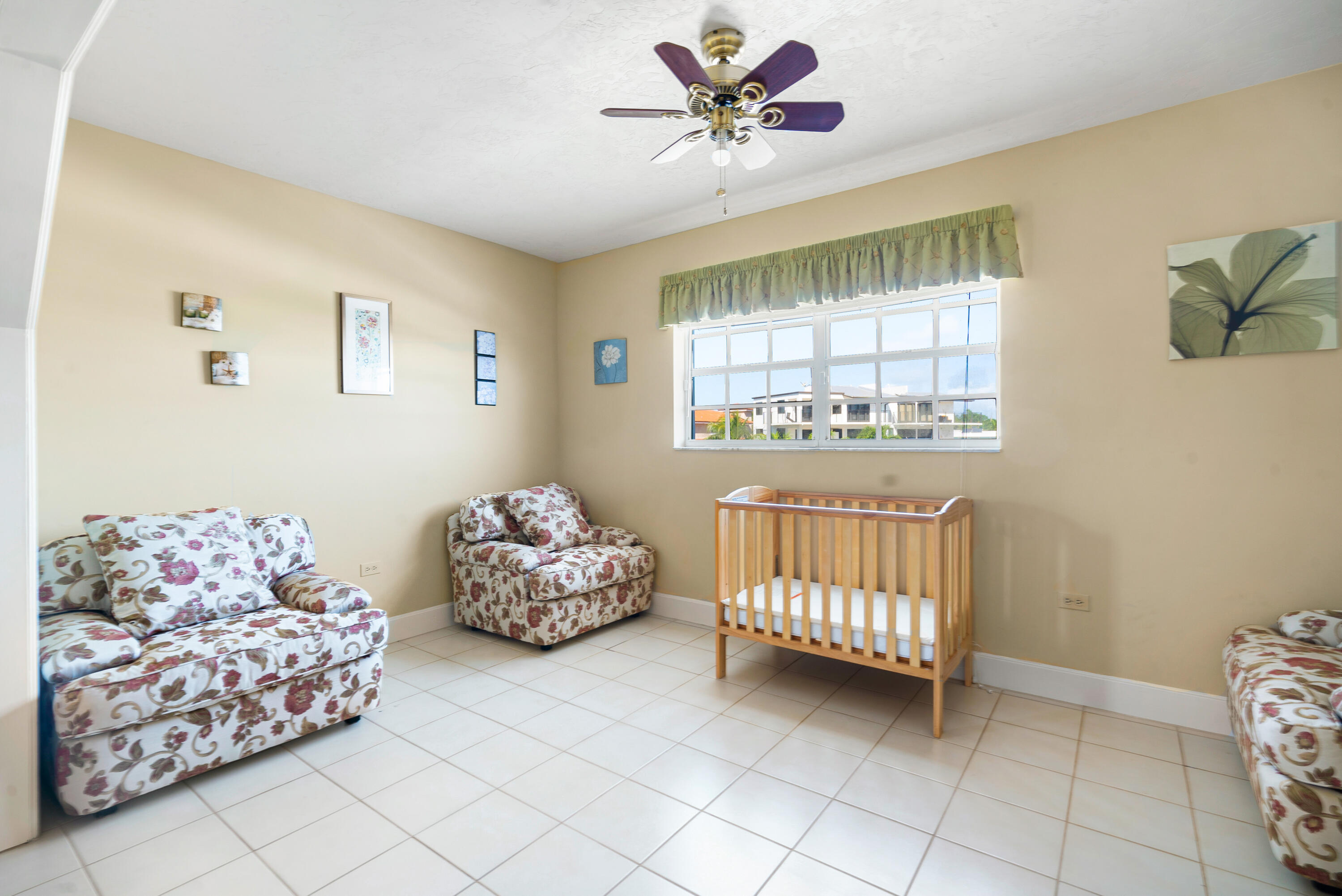 239 Atlantic Boulevard Key Largo, FL 33037 - Photo 32 of 50 a bedroom with a bed and a window