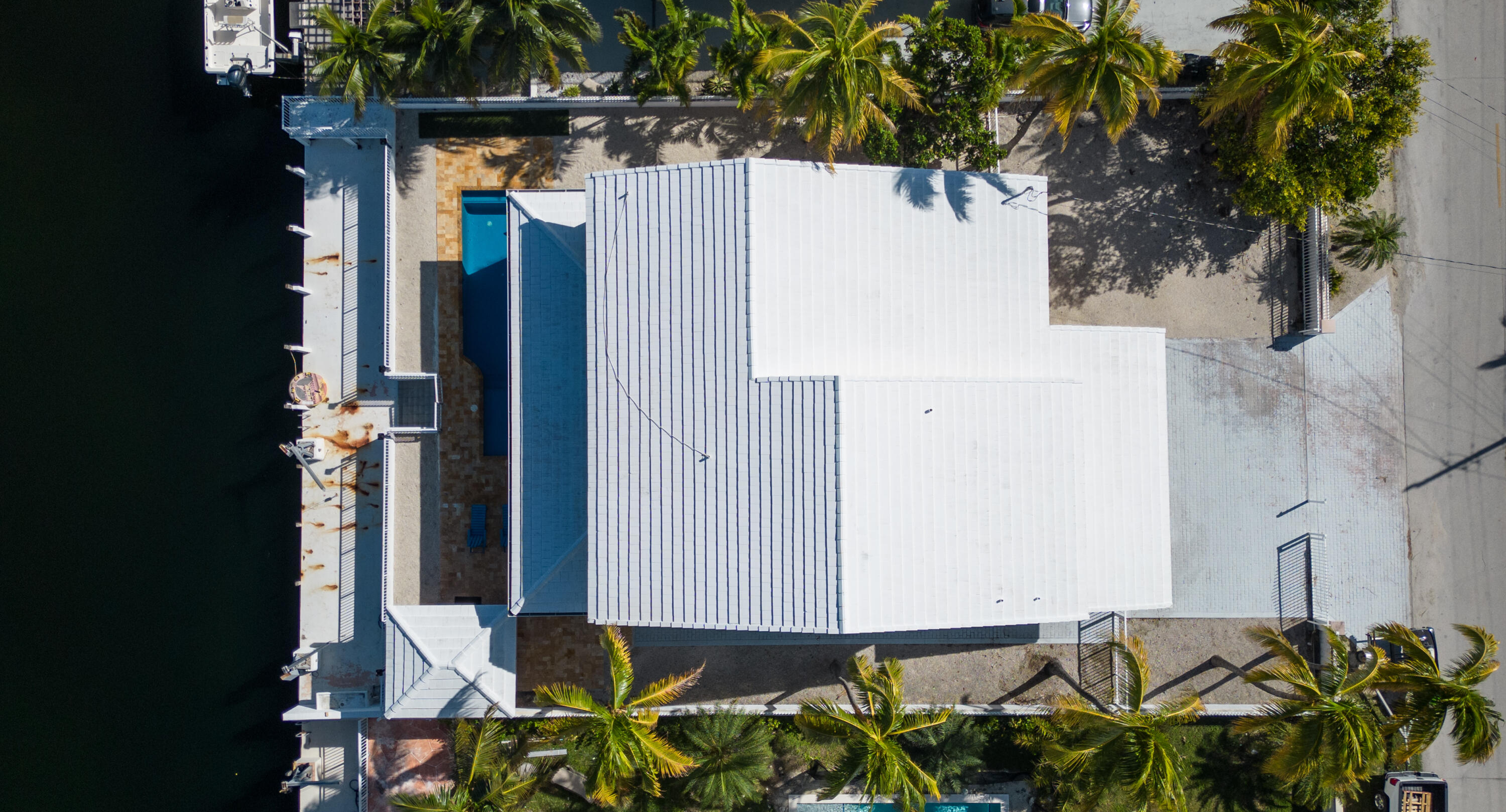 239 Atlantic Boulevard Key Largo, FL 33037 - Photo 39 of 50 a close up of a wall with an outdoor seating