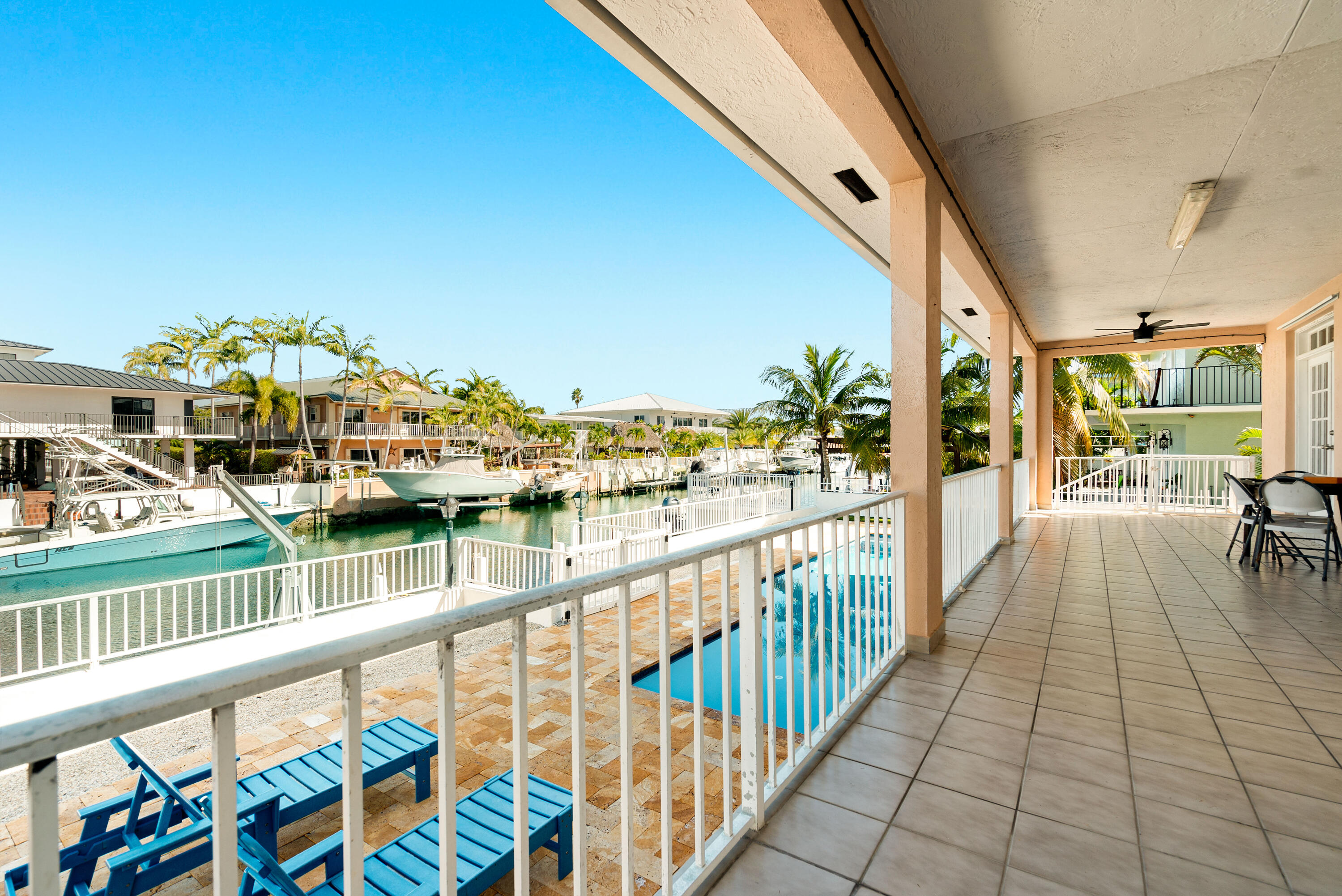 239 Atlantic Boulevard Key Largo, FL 33037 - Photo 40 of 50 a view of a balcony with chairs