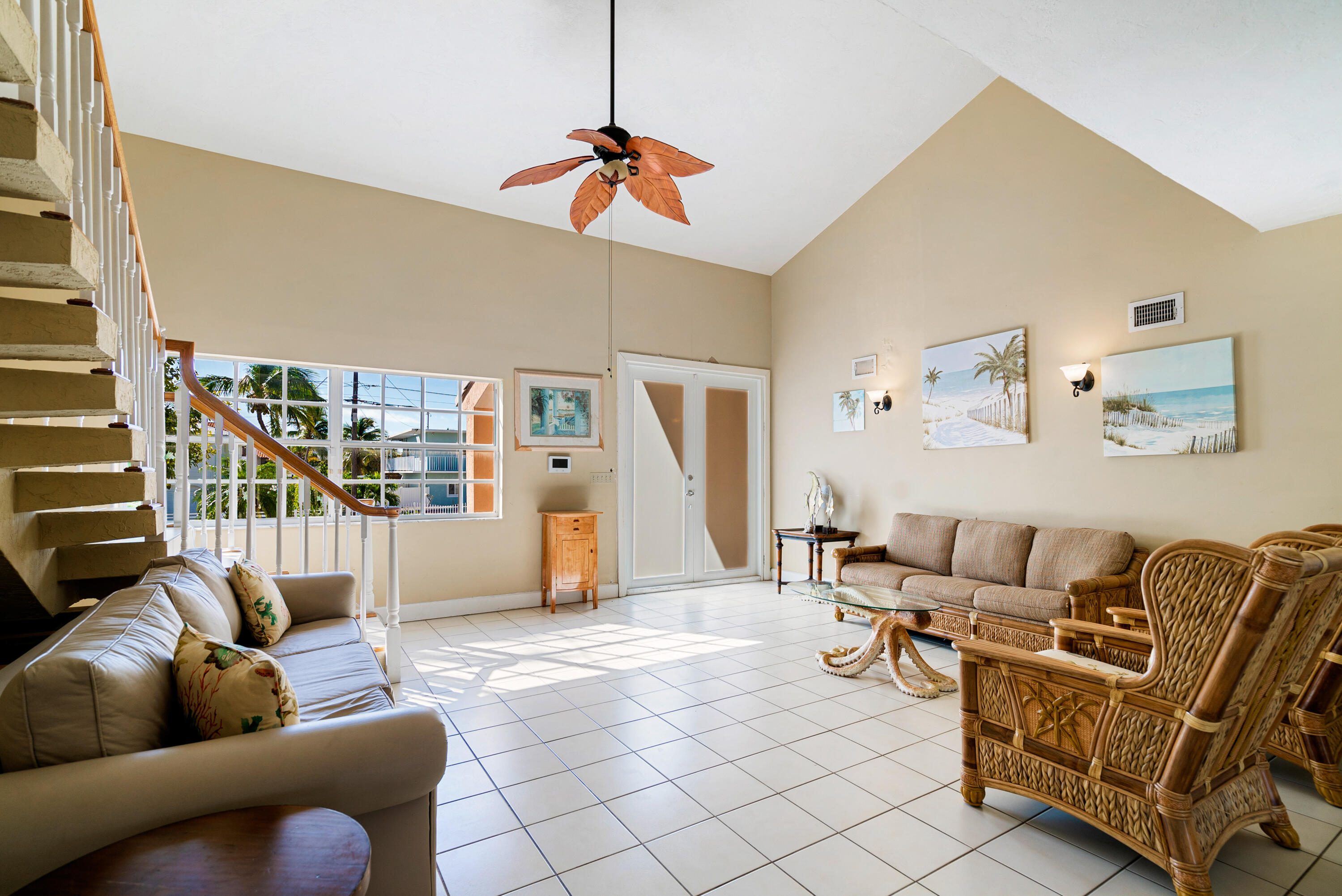 239 Atlantic Boulevard Key Largo, FL 33037 - Photo 6 of 50 a living room with furniture and a rug