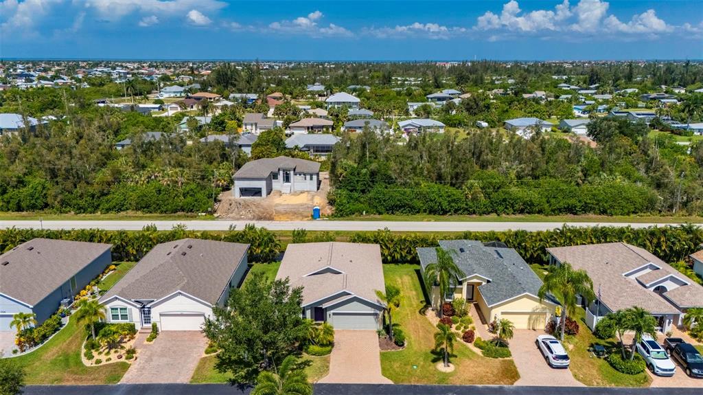 24604 Rio Villa Lakes Circle Punta Gorda, FL 33950 - Photo 6 of 28 an aerial view of residential houses with outdoor space and river