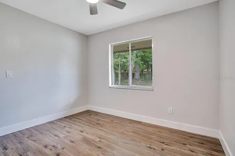 a view of small space with wooden floor