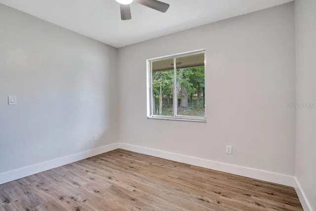 a view of small space with wooden floor