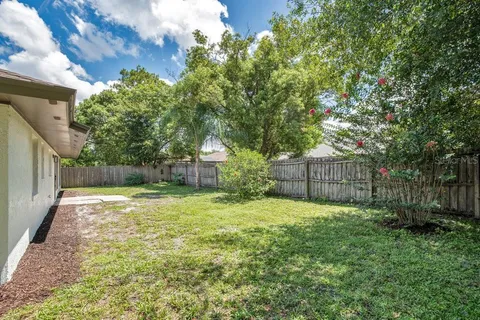 a view of entryway with flower pots