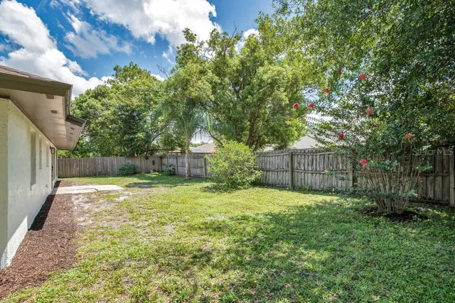a view of entryway with flower pots