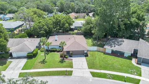 a view of a golf course with a lake