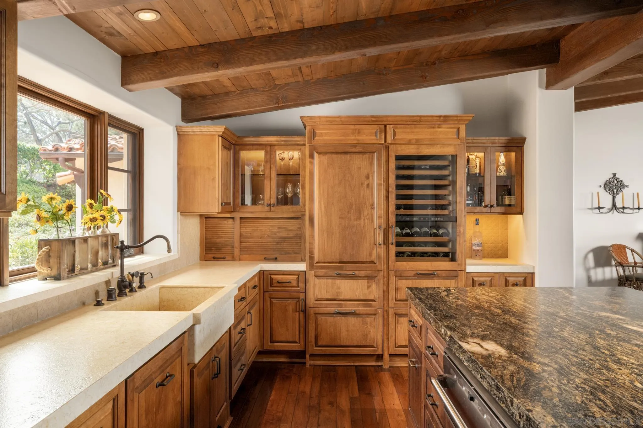 262 Ocean View Avenue Del Mar, CA 92014 - Photo 13 of 45 a view of a kitchen with a sink and wooden floor