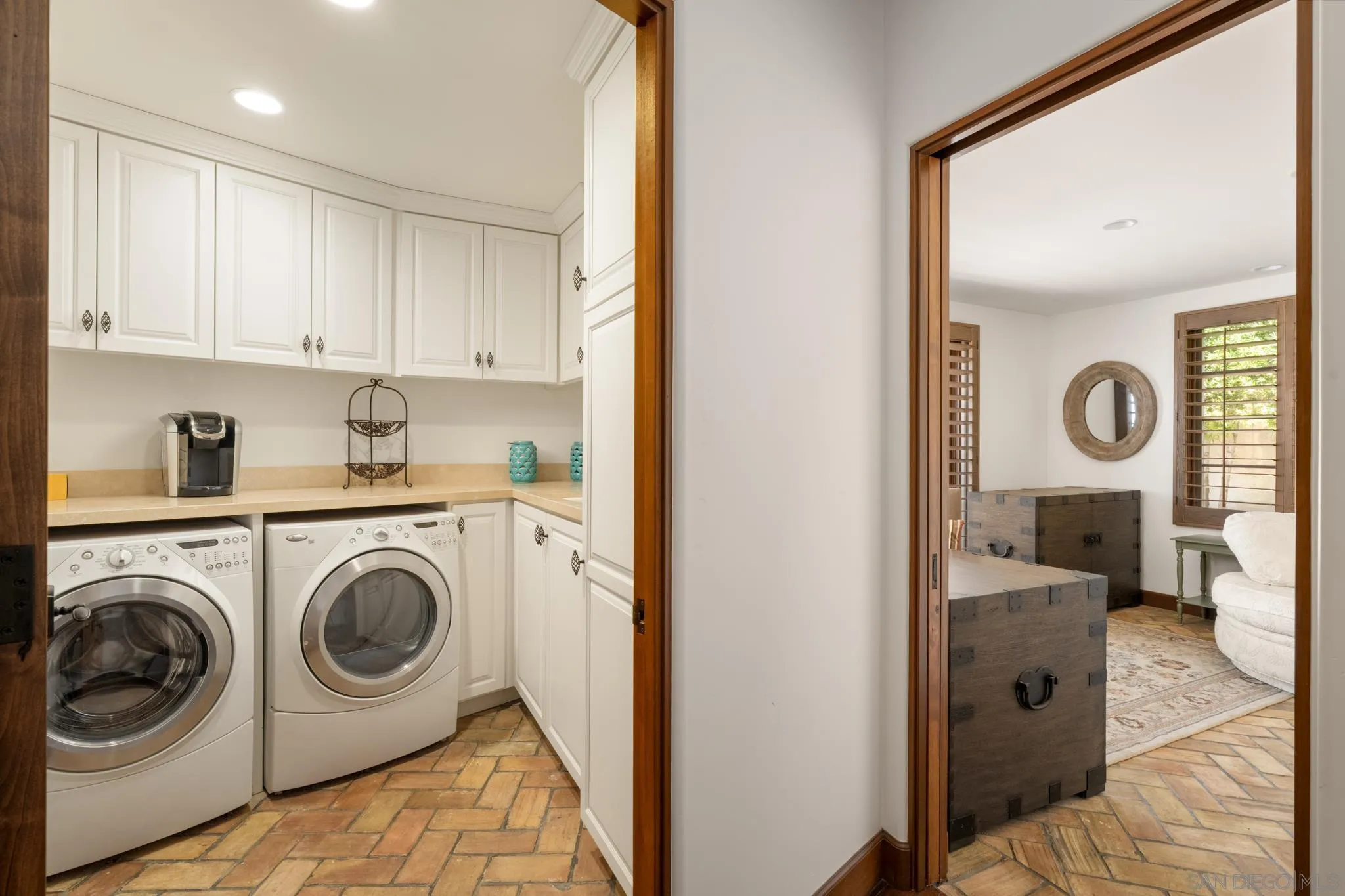 262 Ocean View Avenue Del Mar, CA 92014 - Photo 13 of 45 a view of a kitchen with washer and dryer