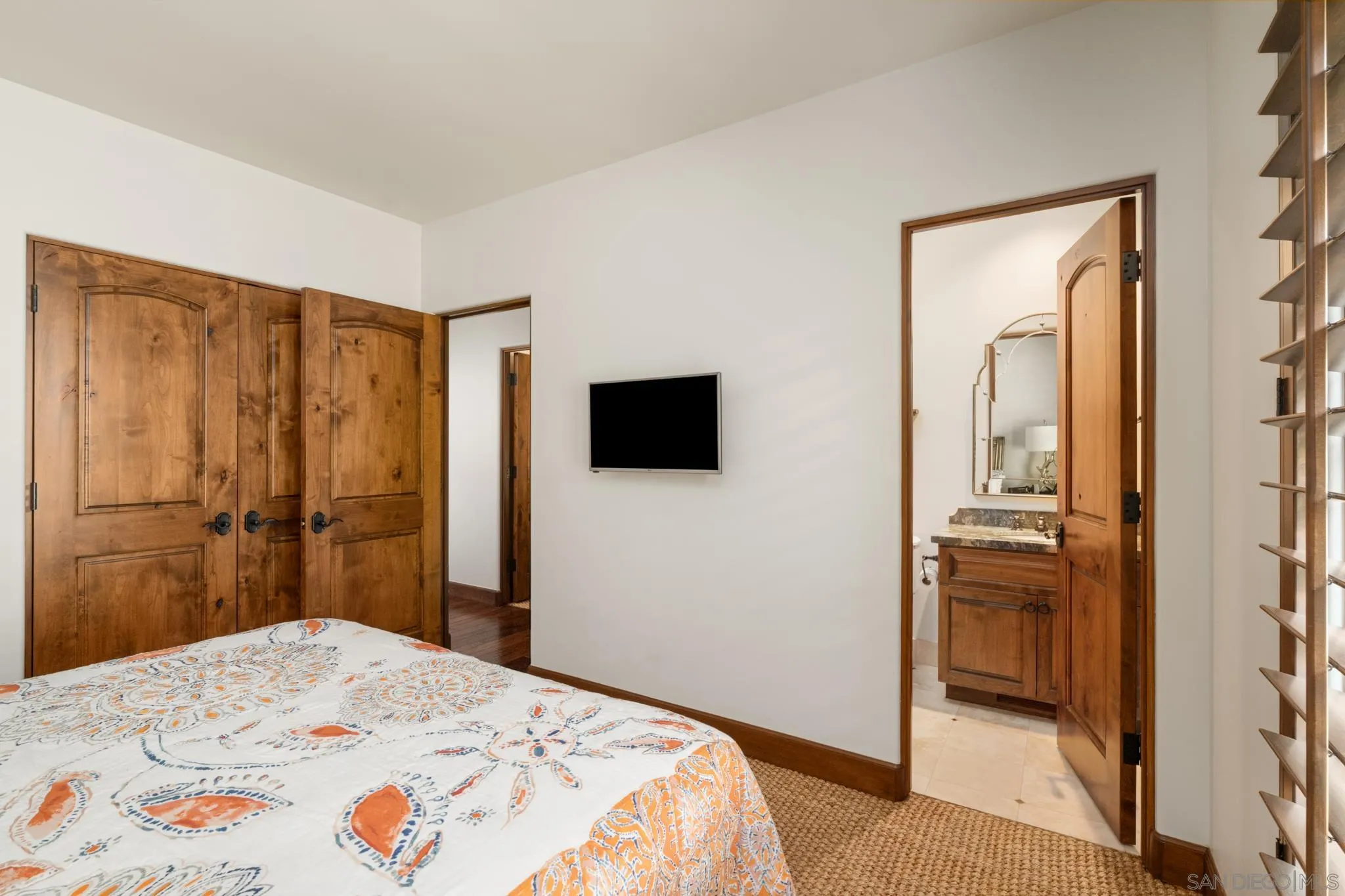 262 Ocean View Avenue Del Mar, CA 92014 - Photo 29 of 45 a bedroom with a bed and a flat screen tv