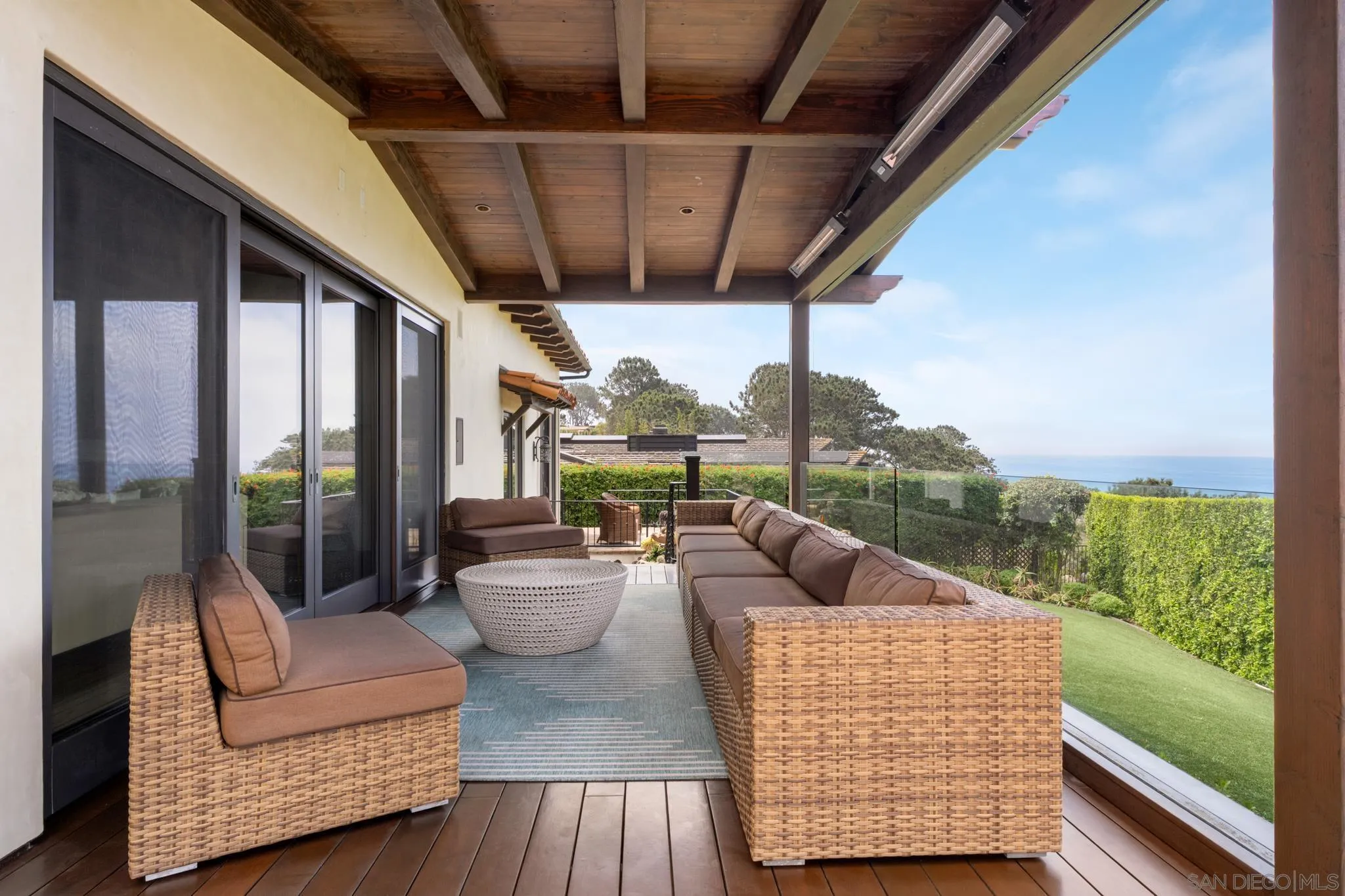 262 Ocean View Avenue Del Mar, CA 92014 - Photo 36 of 45 a outdoor living space with patio furniture and a garden