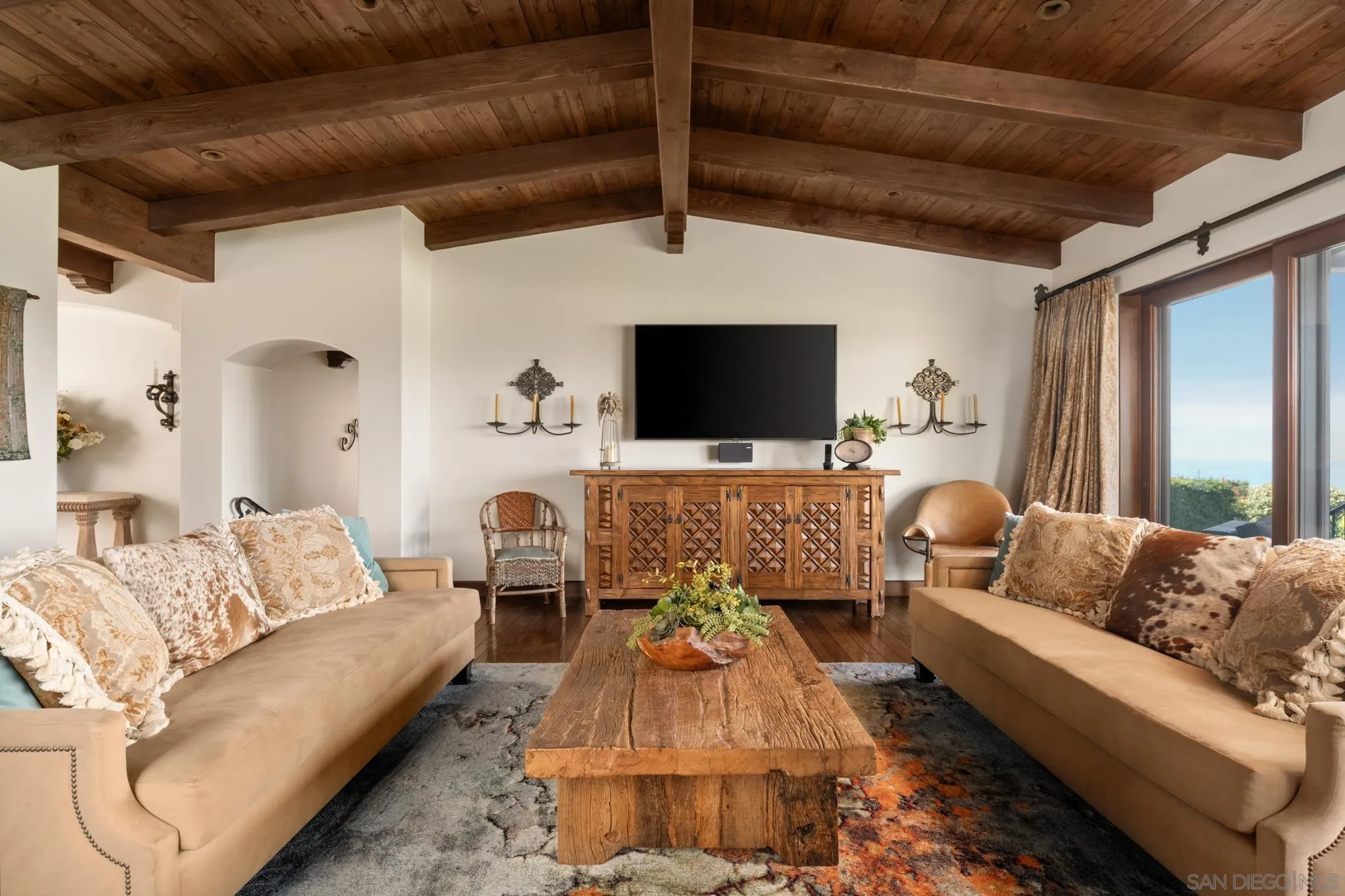 262 Ocean View Avenue Del Mar, CA 92014 - Photo 4 of 45 a living room with furniture and a flat screen tv