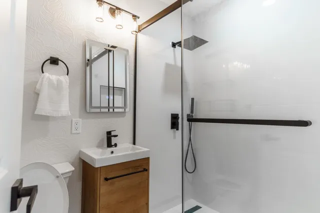 a view of a workspace with furniture