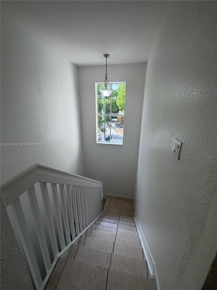 681 Southwest 7th Street, Unit 681 Florida City, FL 33034 - Photo 5 of 16 a view of hallway with window