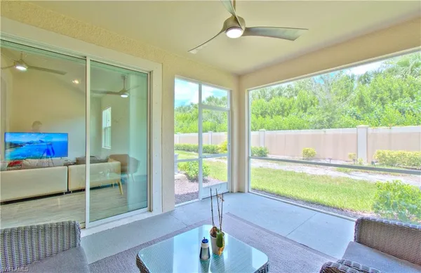 a spacious bathroom with a double vanity sink mirror and a bathtub