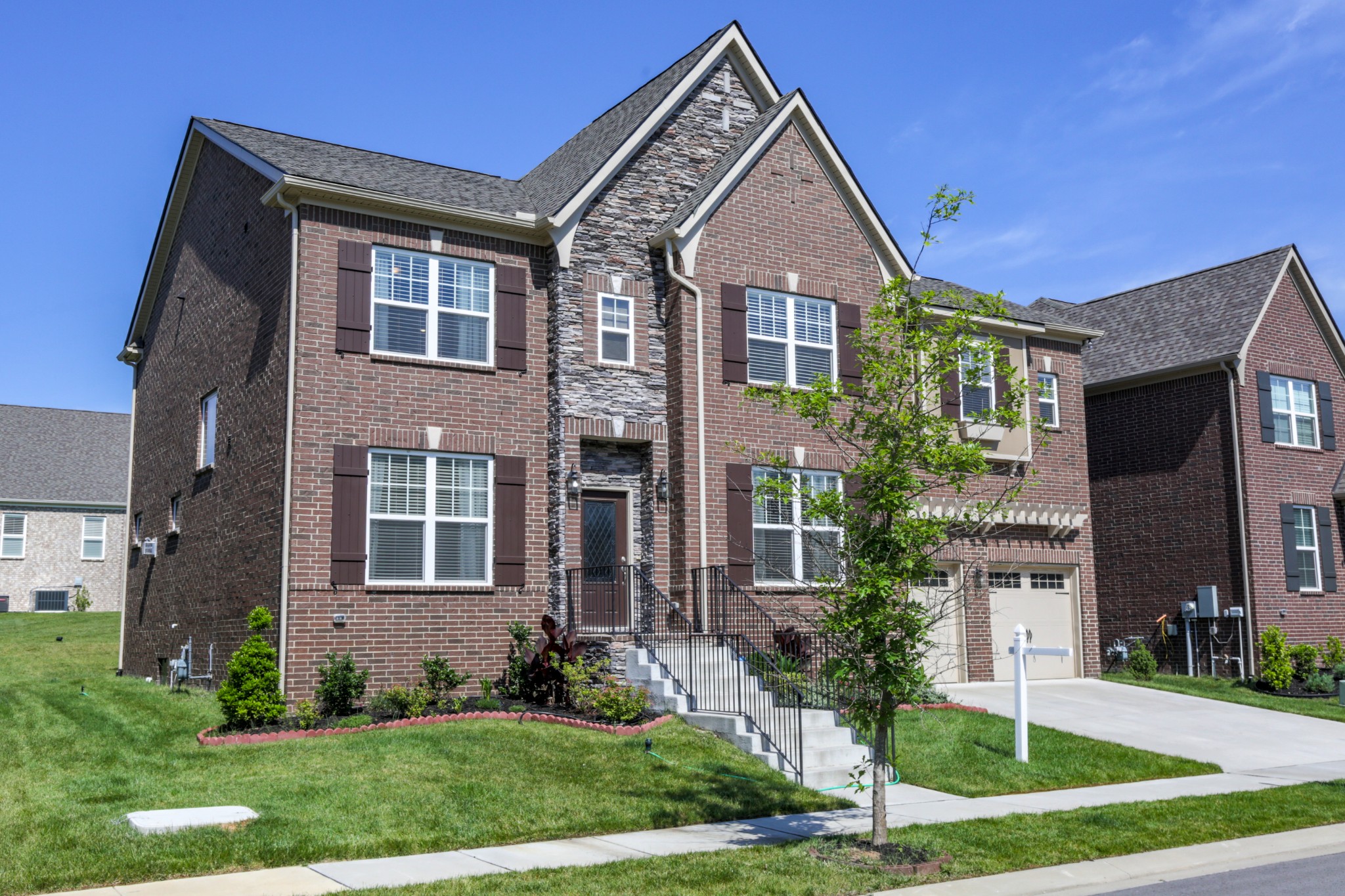 619 Beamon Drive Franklin, TN 37064 - Photo 2 of 43 a front view of a house with a yard