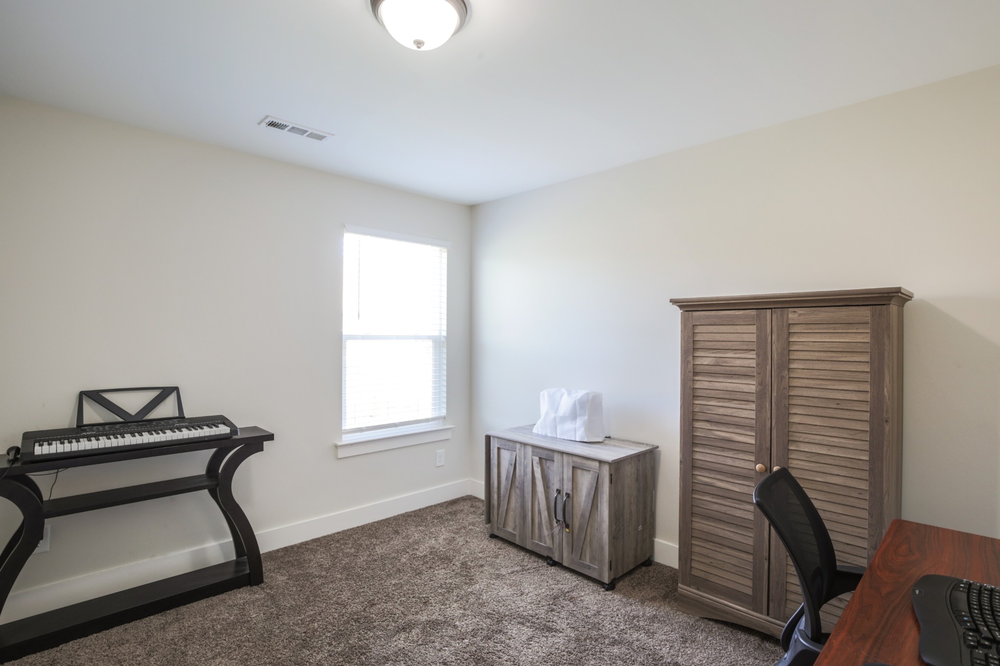 619 Beamon Drive Franklin, TN 37064 - Photo 33 of 43 a view of a workspace with furniture and a window