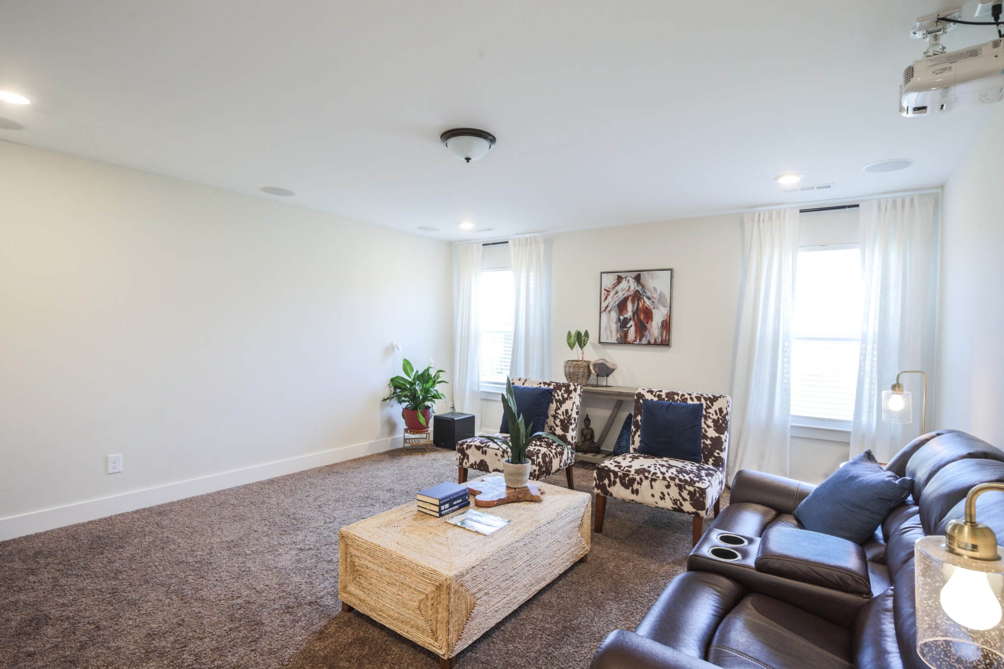 619 Beamon Drive Franklin, TN 37064 - Photo 37 of 43 a living room with furniture and a potted plant
