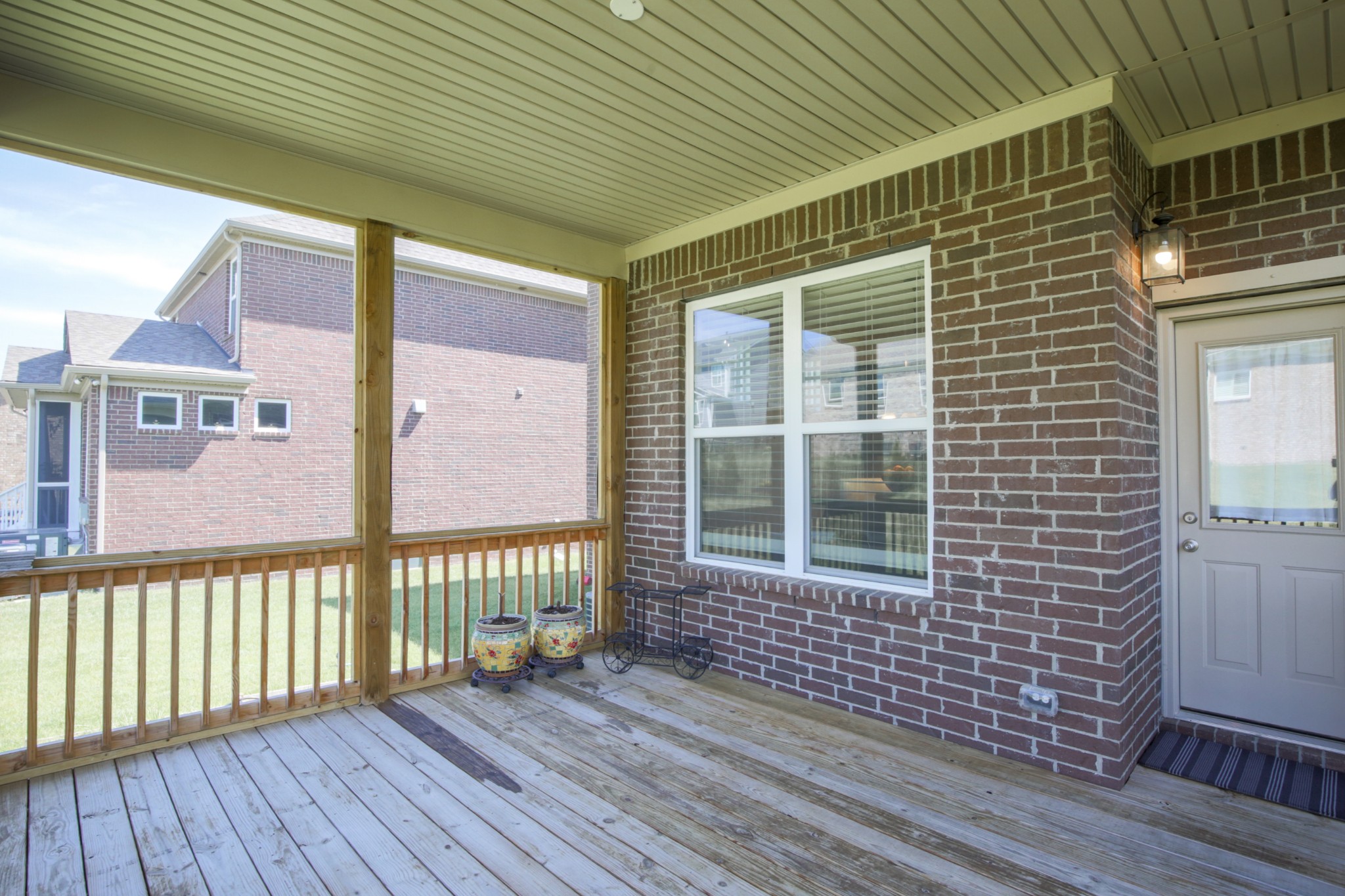 619 Beamon Drive Franklin, TN 37064 - Photo 40 of 43 a view of a brick house with wooden floor