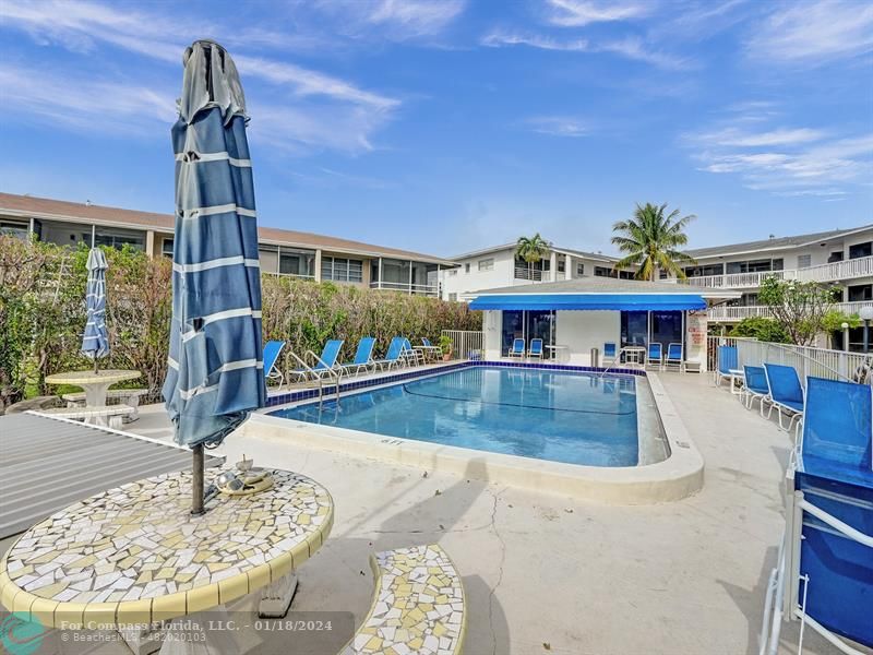 600 Pine Drive, Unit 106 Pompano Beach, FL 33060 - Photo 12 of 15 a view of a house with swimming pool