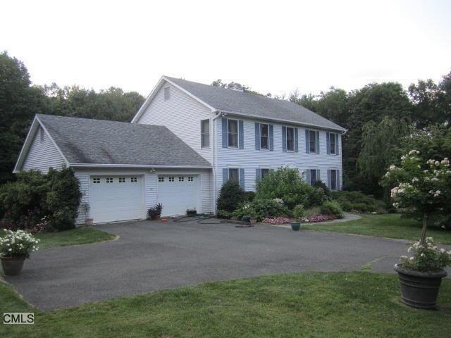 35 Tunnel Road Newtown, CT 06470 - Photo 1 of 1 a view of a house with a garden
