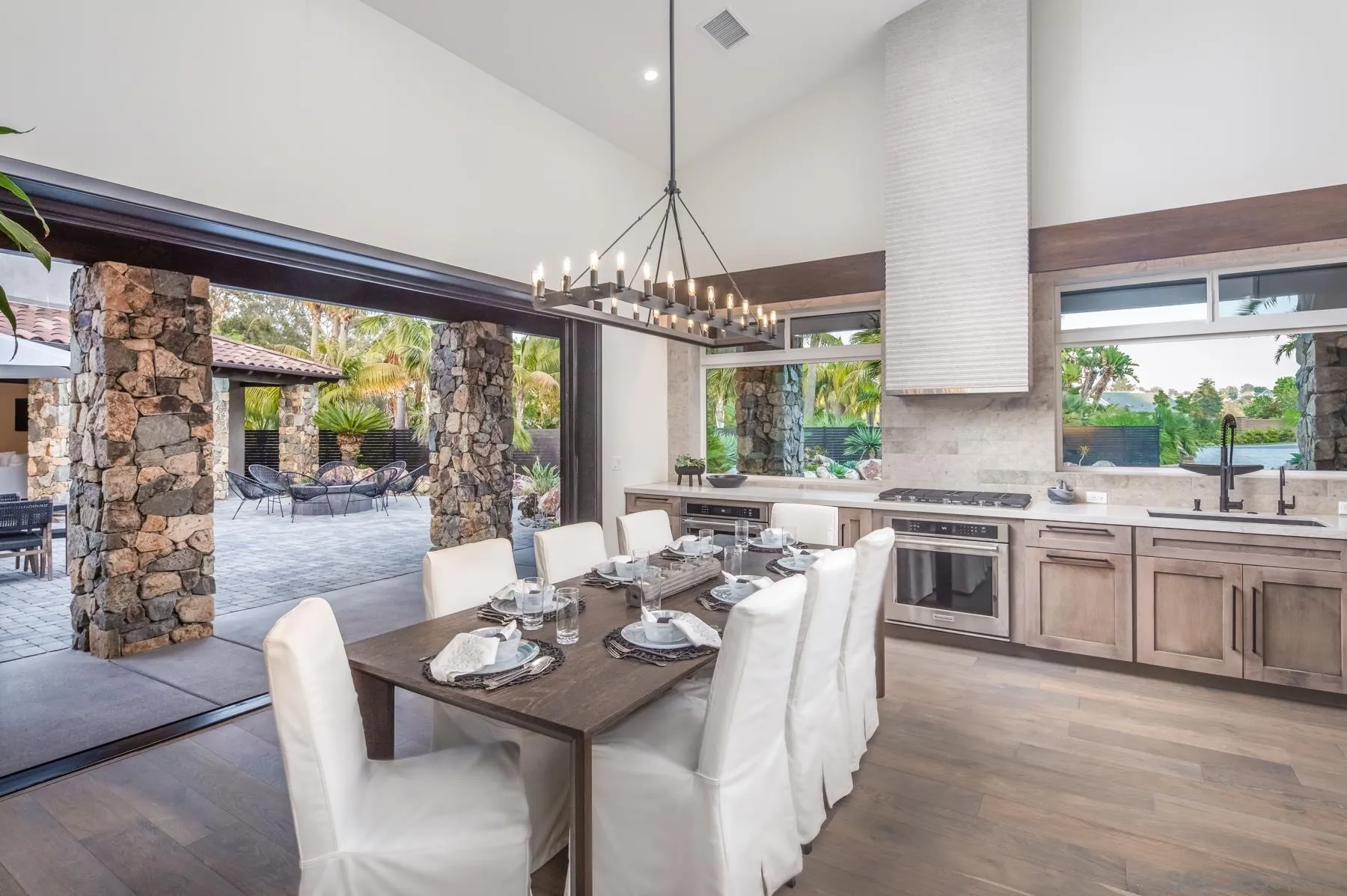 1240 Berryman Canyon Encinitas, CA 92024 - Photo 14 of 66 a very nice looking dining room with a large window and dining table