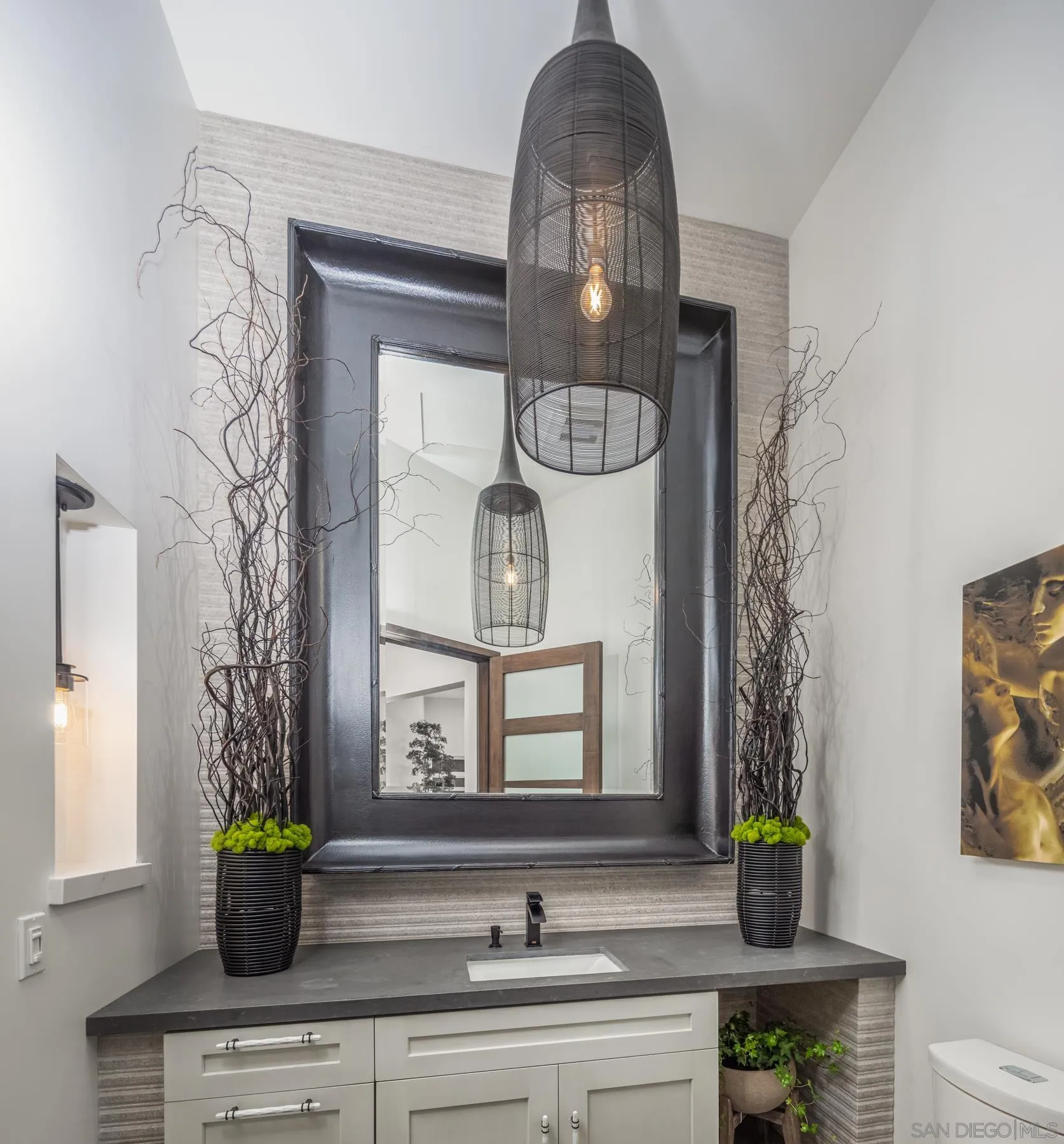 1240 Berryman Canyon Encinitas, CA 92024 - Photo 16 of 66 a bathroom with a sink a mirror and a window