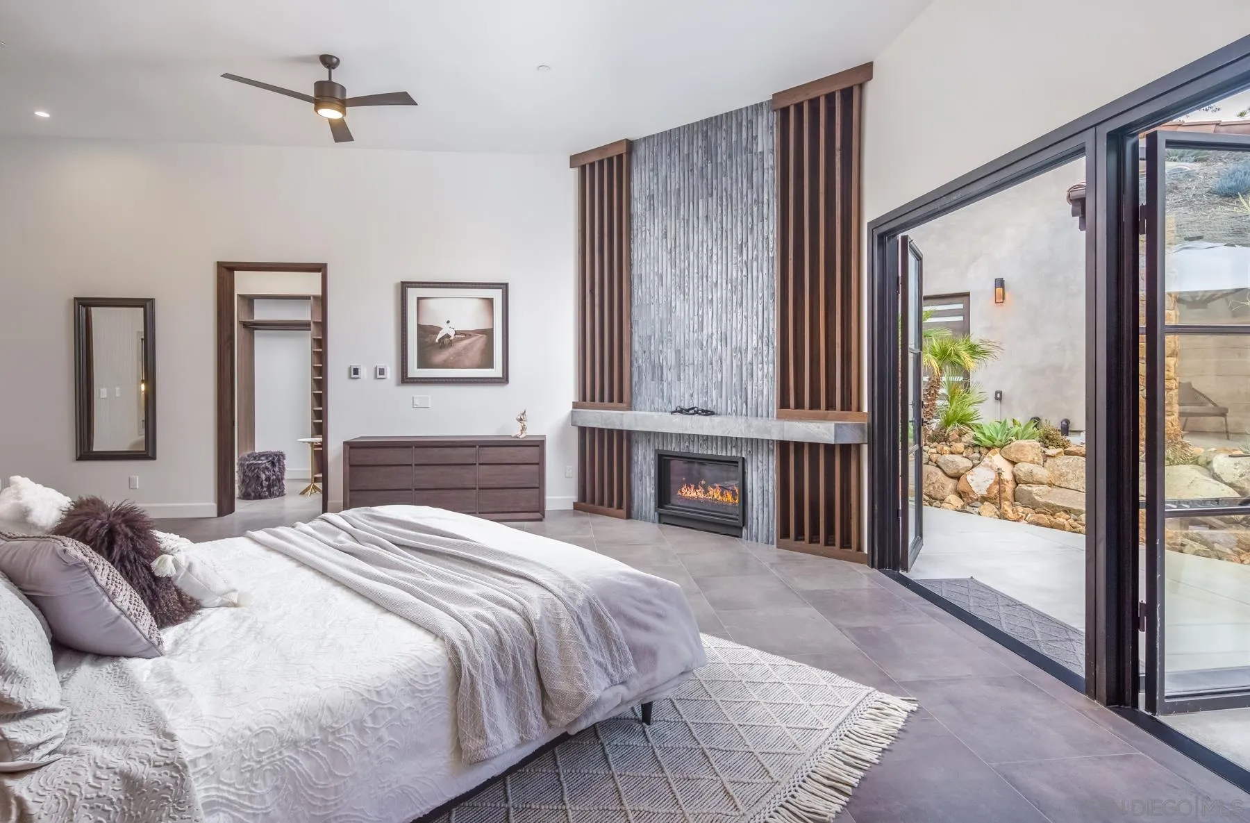 1240 Berryman Canyon Encinitas, CA 92024 - Photo 20 of 66 a bedroom with a bed and a large window