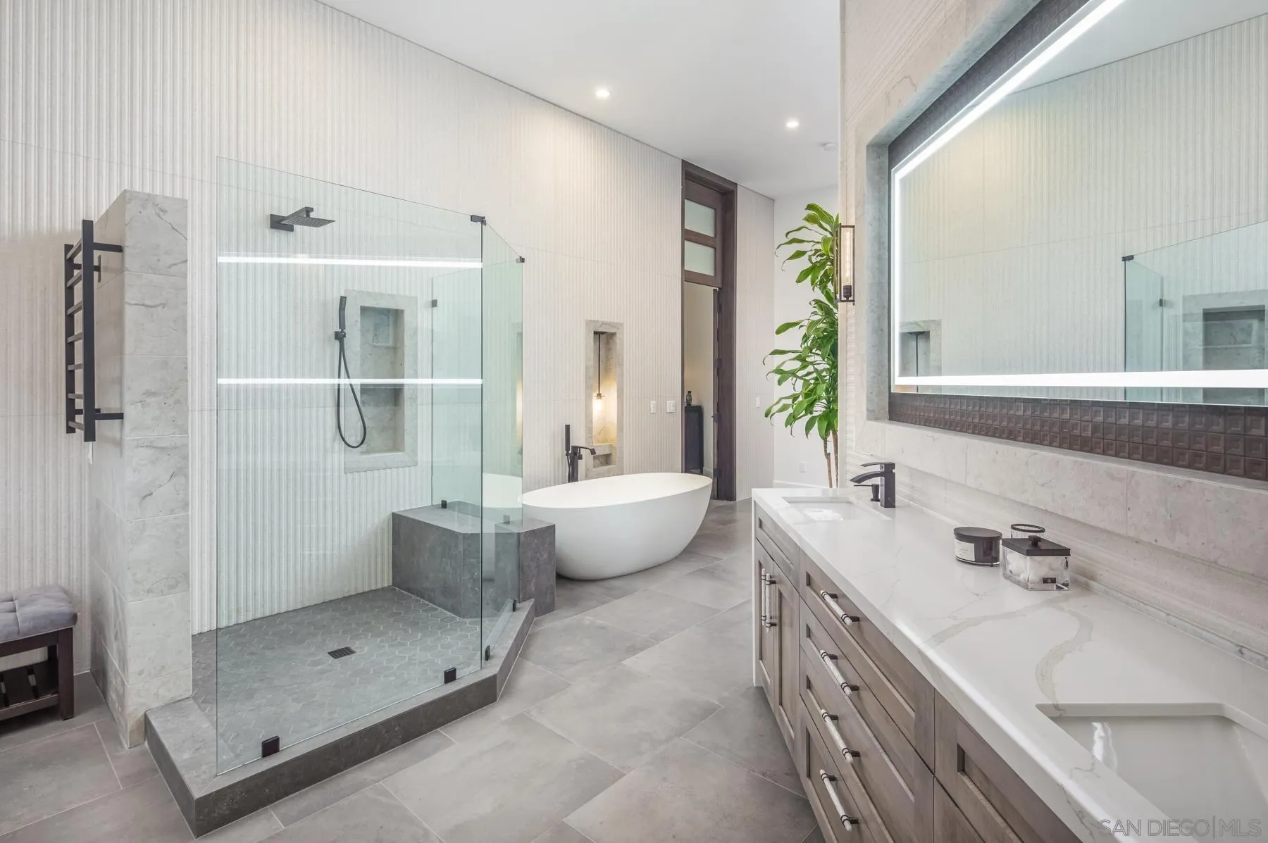 1240 Berryman Canyon Encinitas, CA 92024 - Photo 26 of 66 a bathroom with a double vanity sink toilet and shower