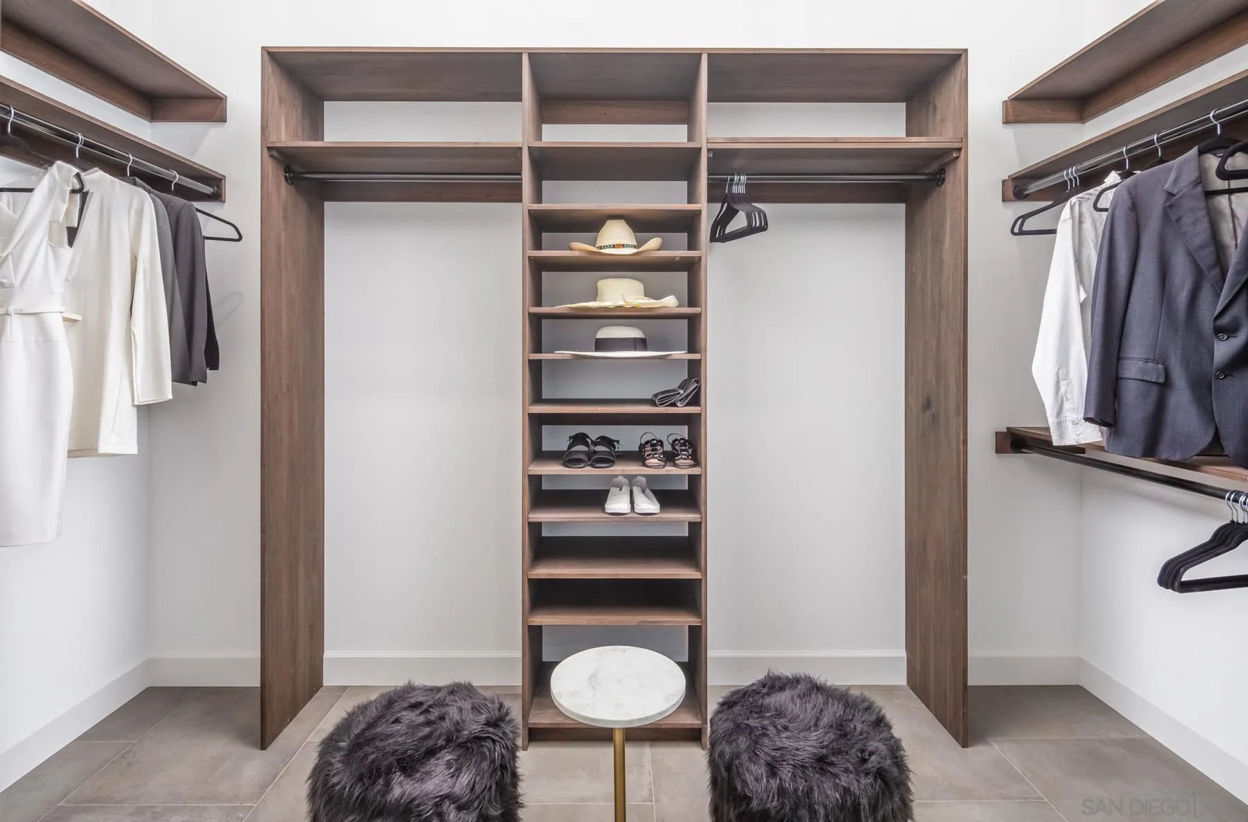 1240 Berryman Canyon Encinitas, CA 92024 - Photo 30 of 66 a view of walk in closet with clothes and shoes