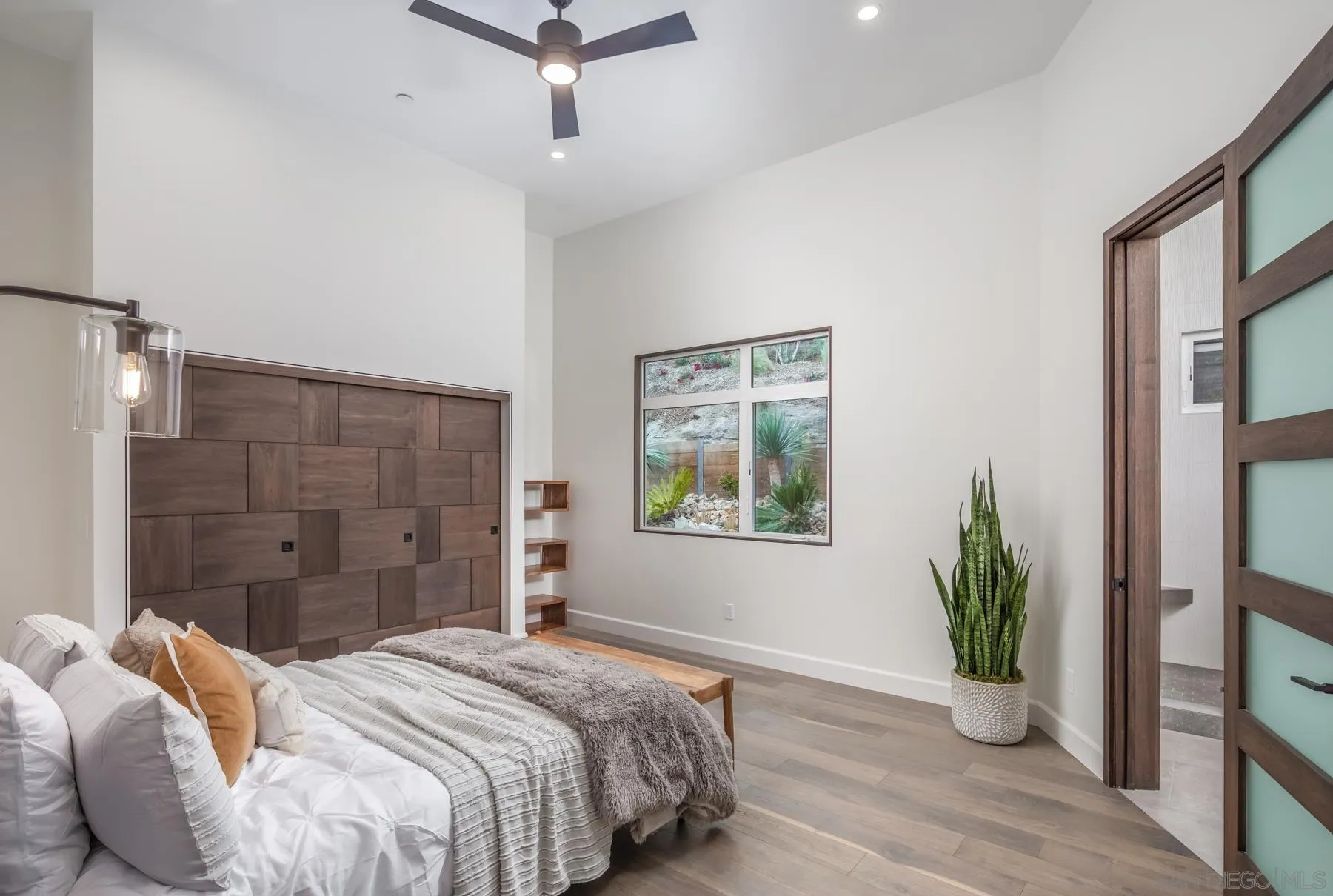 1240 Berryman Canyon Encinitas, CA 92024 - Photo 34 of 66 a bedroom with bed and a window