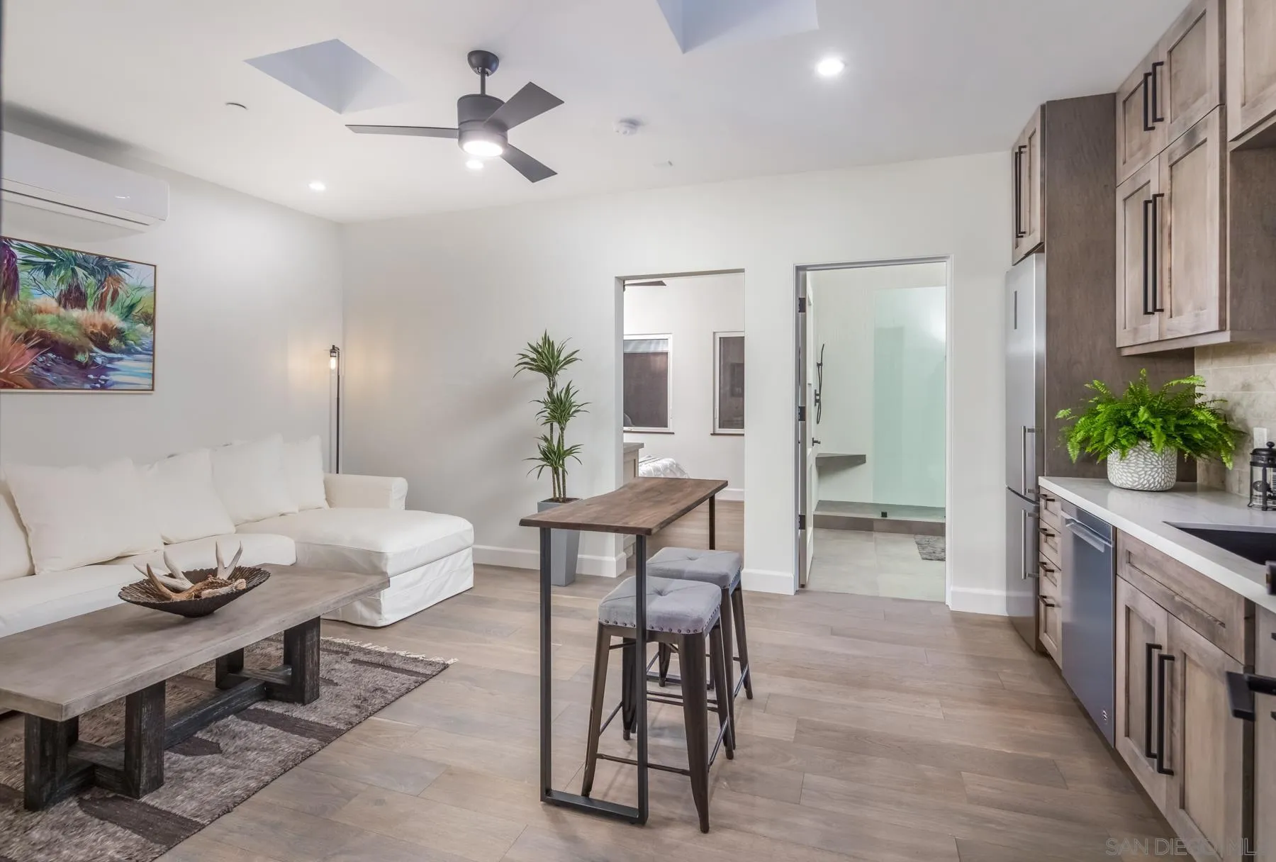1240 Berryman Canyon Encinitas, CA 92024 - Photo 46 of 66 a view of a dining room with furniture and wooden floor