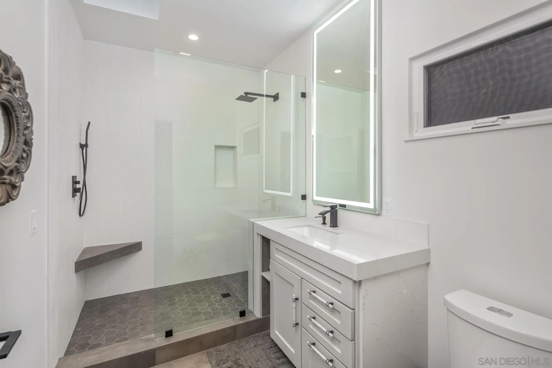 1240 Berryman Canyon Encinitas, CA 92024 - Photo 48 of 66 a bathroom with a sink toilet double vanity and shower