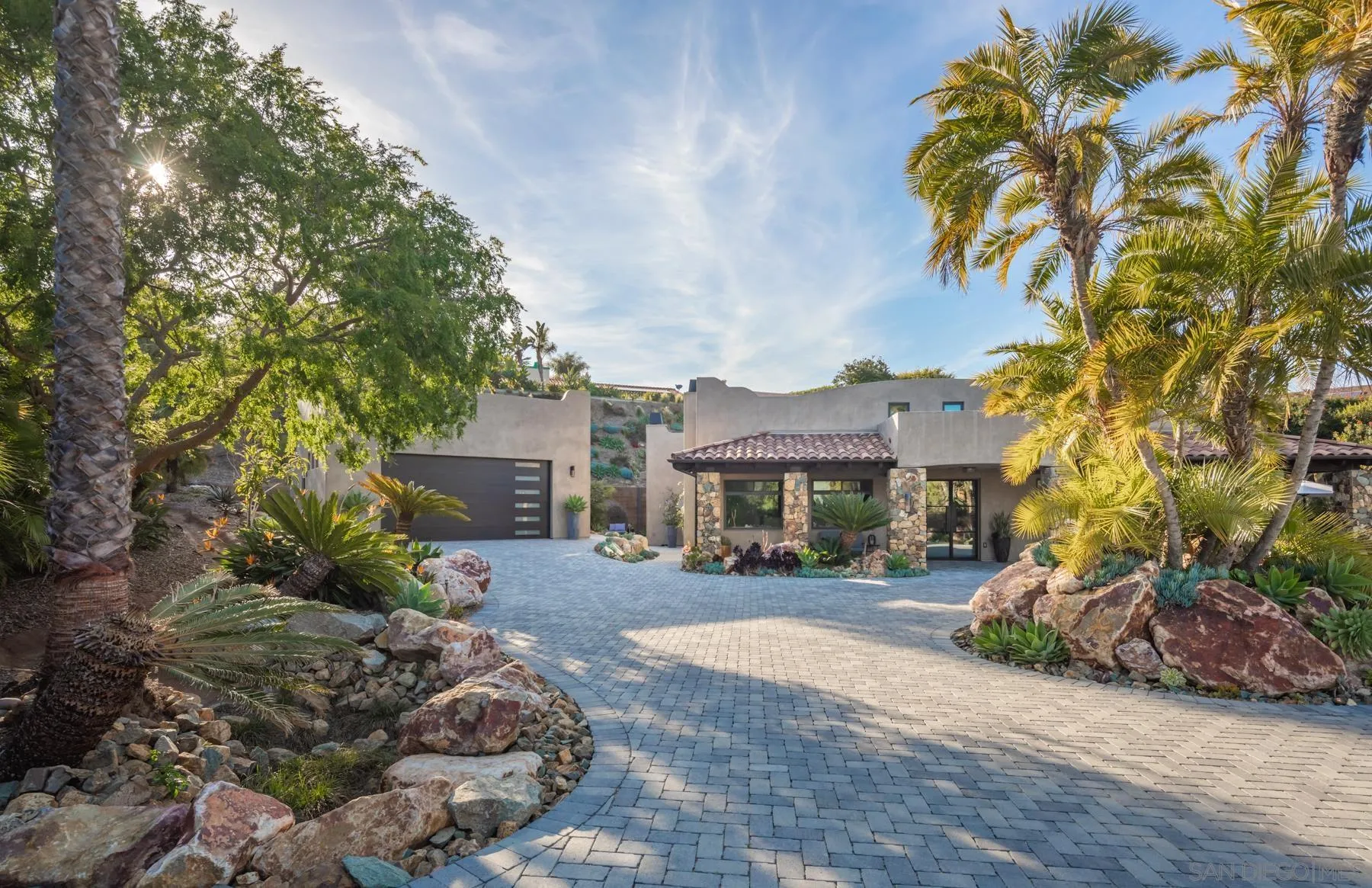 1240 Berryman Canyon Encinitas, CA 92024 - Photo 51 of 66 a front view of a house with a yard tree and outdoor seating