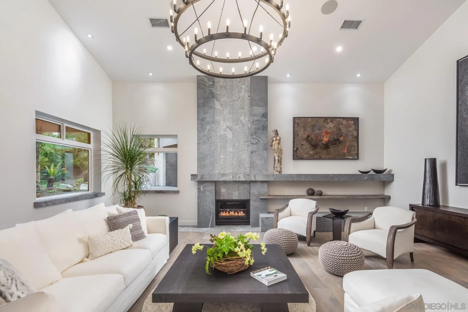 1240 Berryman Canyon Encinitas, CA 92024 - Photo 6 of 66 a living room with furniture a window and a fireplace