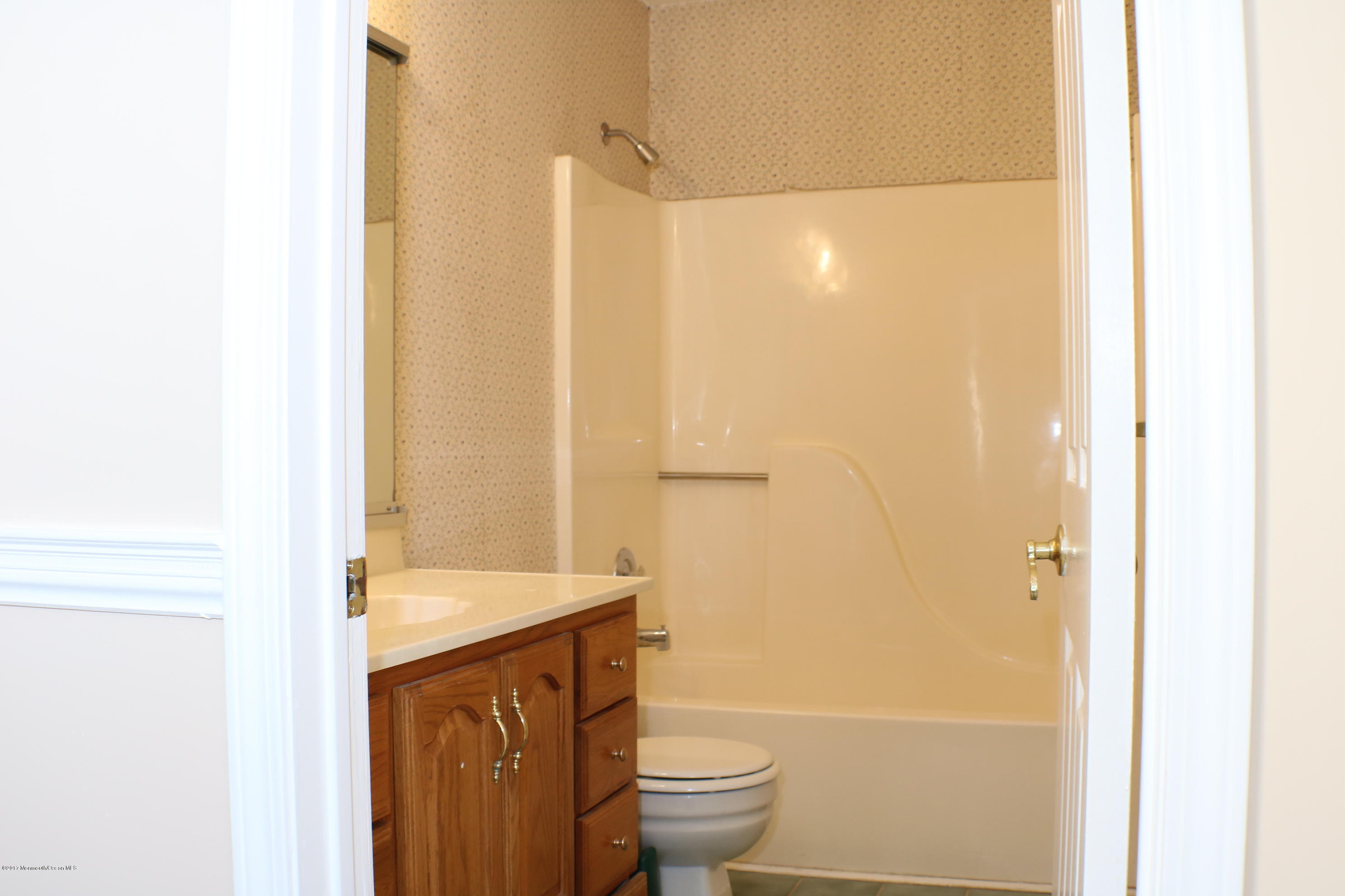 164 Equinox Road Manahawkin, NJ 08050 - Photo 17 of 35 a bathroom with a granite countertop sink toilet and shower