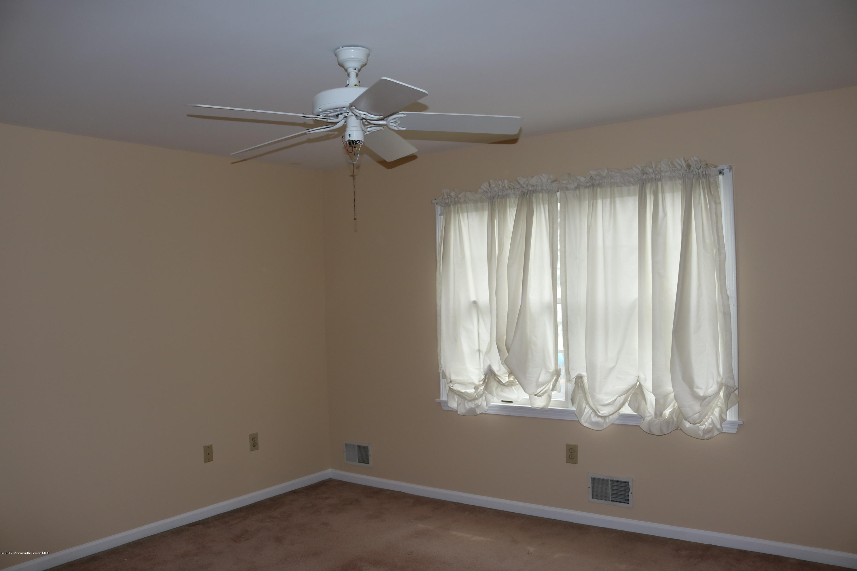 164 Equinox Road Manahawkin, NJ 08050 - Photo 2 of 35 an empty room with windows
