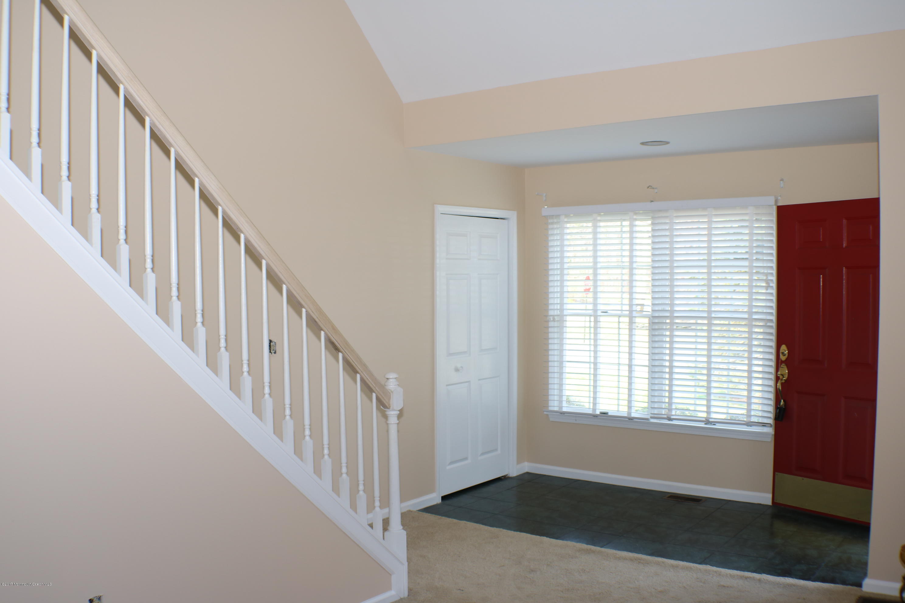 164 Equinox Road Manahawkin, NJ 08050 - Photo 26 of 35 a view of an entryway with wooden floor