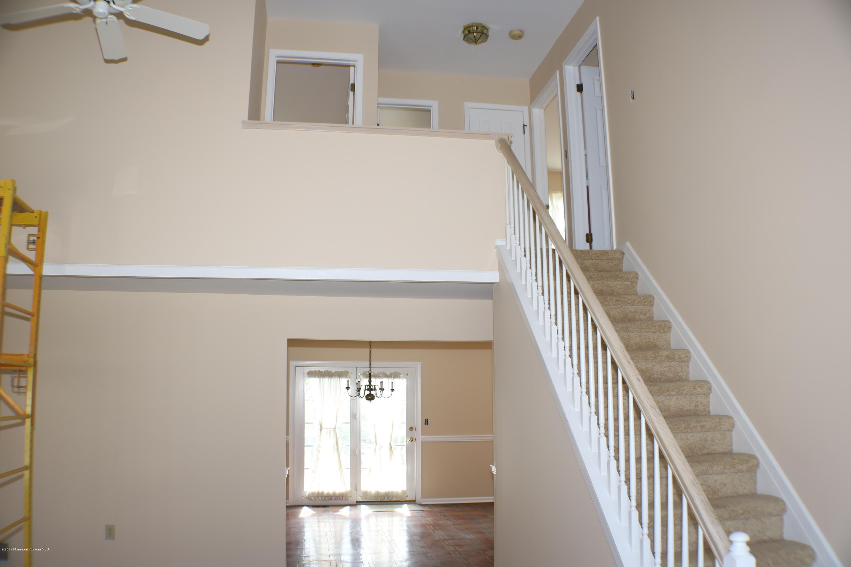 164 Equinox Road Manahawkin, NJ 08050 - Photo 28 of 35 a view of staircase with railing and white walls